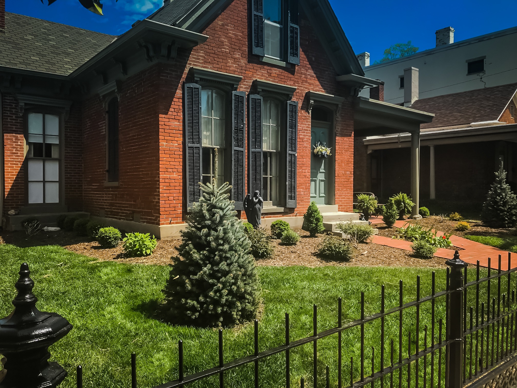 Historic red brick house with garden
