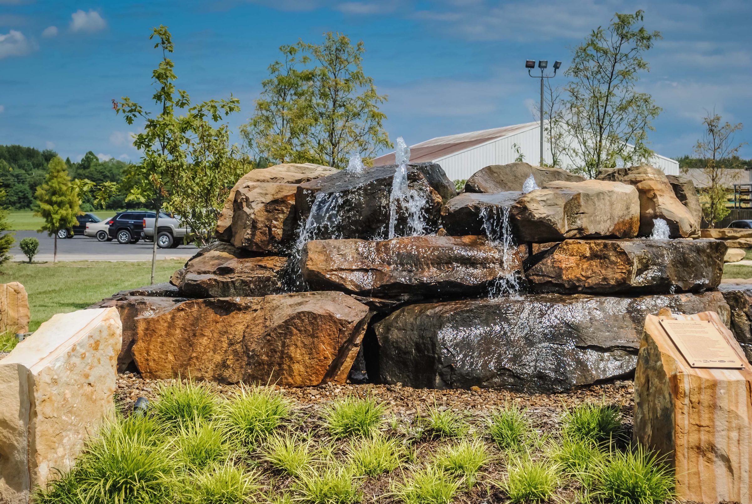 Rock waterfall with small grassy area