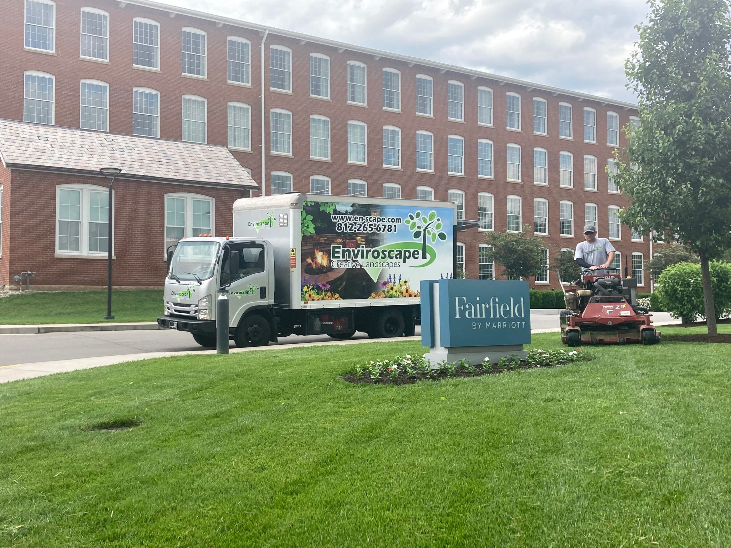 Landscaping truck and mower at Fairfield by Marriott.